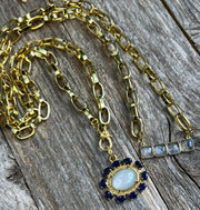 Exquisite blue sapphire, moonstone and diamond pendant with moonstone connector on chunky gold paperclip chain