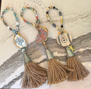 Large gemstone and shell decoupage decor with handcrafted large tin and jute tassels