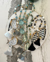 Gemstone and oyster decoupage garlands