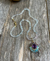 Knotted pastel aquamarine gemstone necklace with amethyst, diamond, ruby and blue topaz pendant