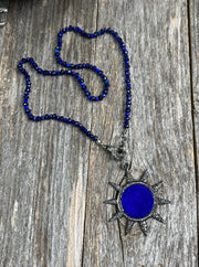 Sol Azul - Blue sapphires and blue lapis lazuli hand-knotted gemstones with a large blue lapis lazuli and pave diamond sun pendant and pave diamond lobster clasp
