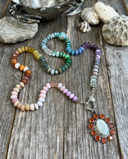 Le Sirenuse - Exclusive hand-knotted 10-14mm gemstone bead necklace in a gorgeous rainbow variation with a sterling silver and pave diamond lobster clasp which holds a large, one-of-a-kind, white rainbow moonstone, orange carnelian and pave diamond flower pendant set in sterling silver