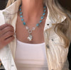 Turquoise faceted gemstone with rainbow moonstone bezel necklace and large baroque pearl pendant