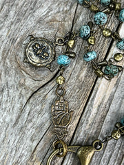 Jade gemstone tassel pendant necklace with jade and bronze bead chain and solid bronze charms