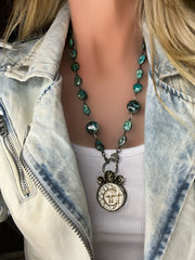Malachite gemstone bezel with chrysocolla gemstones, pave diamond clasp and handcrafted sun and moon pendant