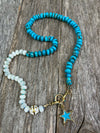 Hand-knotted Kingman turquoise and mother of pearl gemstone bead necklace with pave diamond star pendant