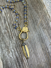 Light blue kyanite gemstone rosary chain necklace with pave diamond lobster clasp and pave diamond surfboard pendant