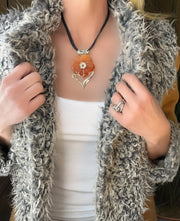Vintage orange carnelian gemstone flower and sterling silver pendant necklace with black leather strands