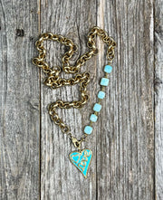 Turquoise blue enamel and genuine pave diamond heart pendant paired with a matte gold rolo link and Peruvian opal gemstone bezel chain