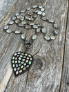 Stunning Ethiopian opal heart pendant with a light beige moonstone gemstone bezel chain and pave diamonds lobster clasp