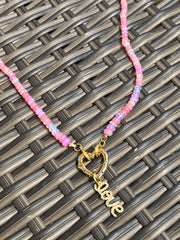 Rare pink Ethiopian opal bead necklace with gemstone heart clasp and pave diamond "love" charm