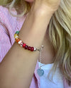 Hand-knotted semiprecious gemstone rainbow bead bracelet with sterling silver extender and charm