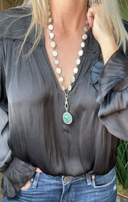 Oval, faceted, mystic moonstone gemstone bezel necklace with double-sided diamond lobster lock and turquoise and diamond pendant