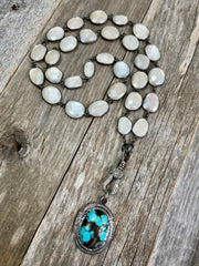 Oval, faceted, mystic moonstone gemstone bezel necklace with double-sided diamond lobster lock and turquoise and diamond pendant