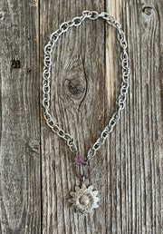 Genuine pave diamond flower pendant with genuine ruby lobster clasp on textured silver oval link chain