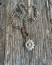 Genuine pave diamond flower pendant with genuine ruby lobster clasp on textured silver oval link chain